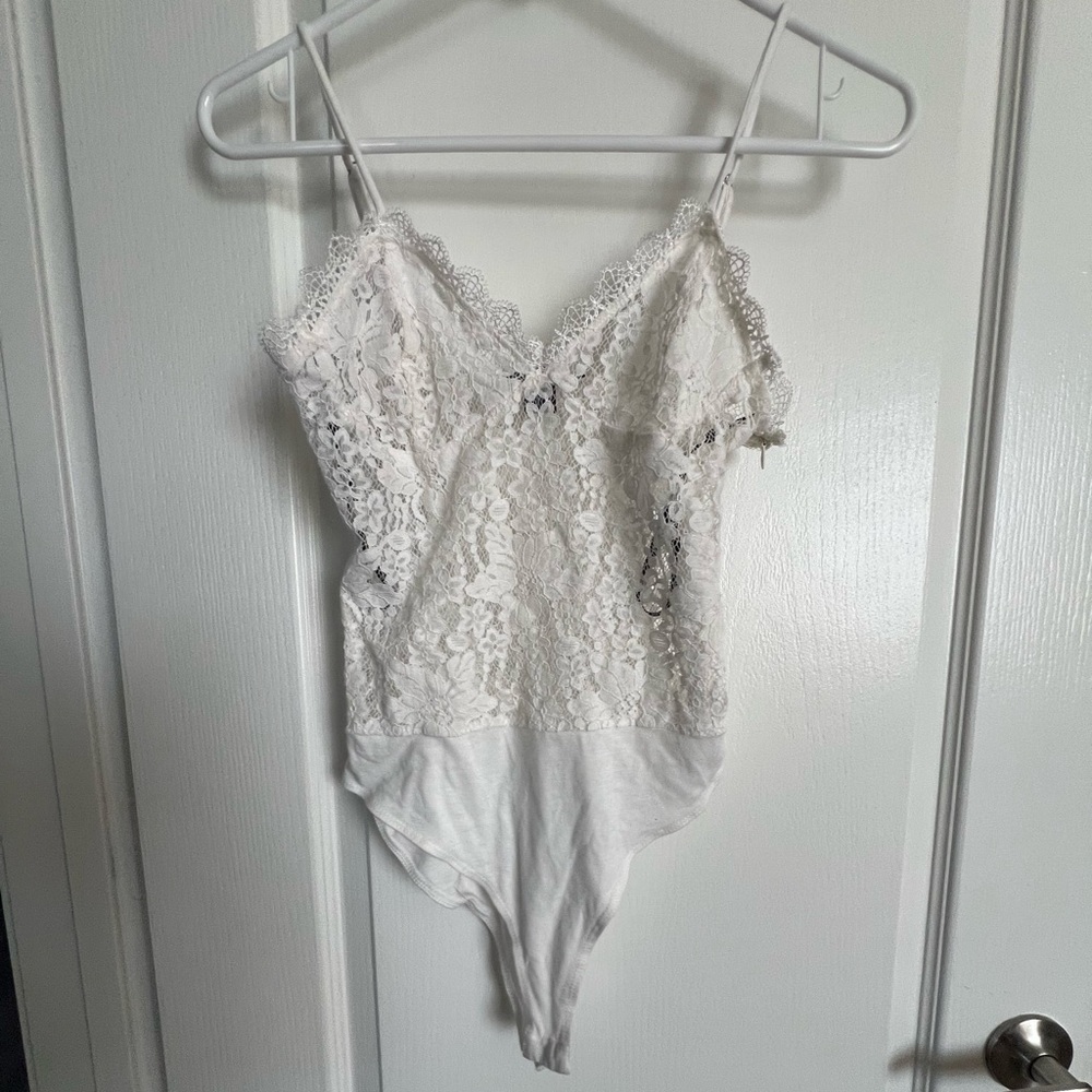 Forever 21. White laced body suit.